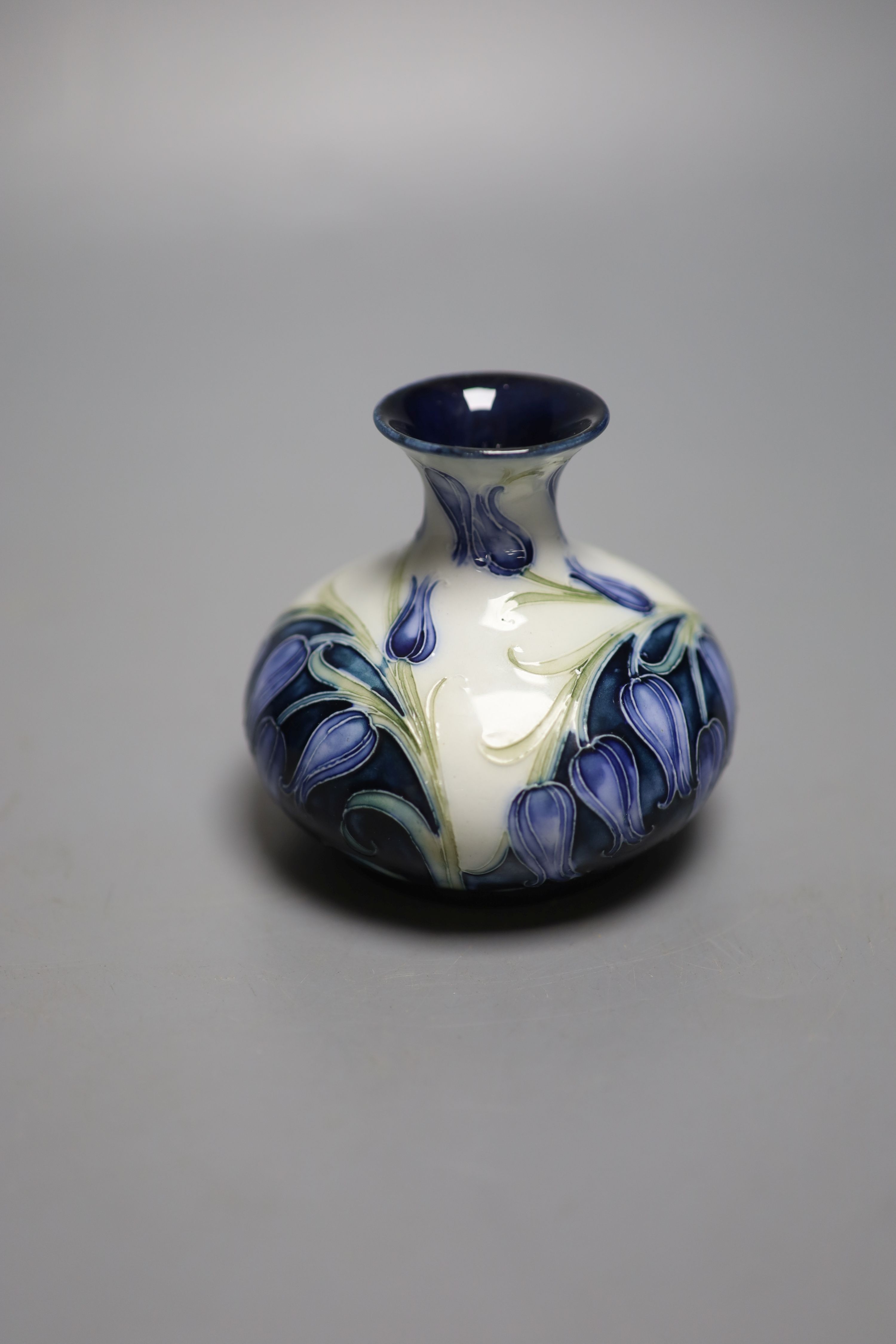 A Moorcroft for MacIntyre florian ware posy vase, some restoration